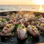 Chipirons à la plancha au piment d’Espelette, un aperçu de la recette qui ouvre l’article sur leur cuisine et leur pêche.